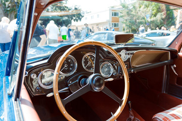 Inside of an old car at the car show