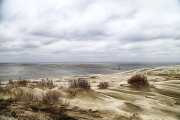Beautiful view on sand dunes of the Curonian spit. Nida in Lithuania and Kaliningrad region in Russia
