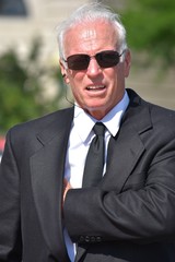 Handsome Senior Security Guard Smiling Wearing Sunglasses