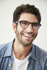 Fototapeta premium Handsome guy in glasses, laughing