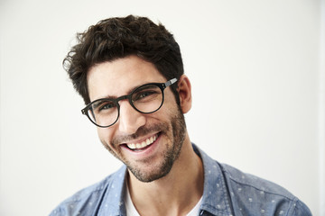 Obraz premium Handsome guy in glasses, portrait