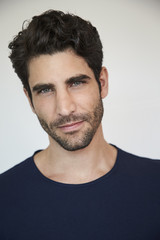 Fototapeta premium Blue eyed guy in portrait, studio