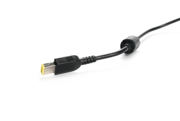 Black laptop power cable with socket isolated on white background