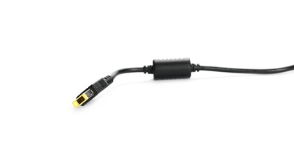 Black laptop power cable with socket isolated on white background