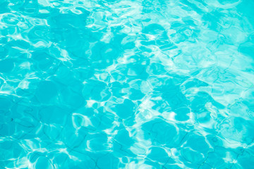 Water swimming pool. pool with blue water. Background of clean blue rippled water in a hotel swimming pool
