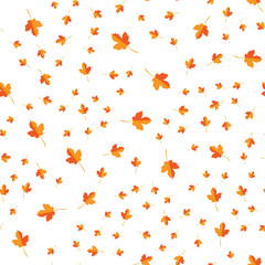 Seamless pattern of autumn yellow leaves randomly