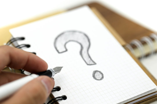 Miniature people : Businessman with THE QUESTION MARK using for concept Punctuation Day