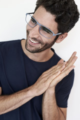 Fototapeta premium Good looking guy in spectacles, looking away