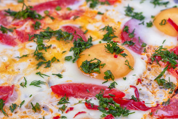 Breakfast scrambled eggs with tomatoes