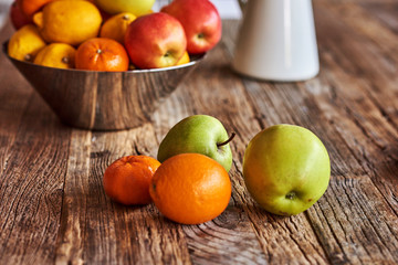 Naklejka na ściany i meble Fruit on old weathered table.