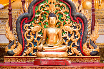 Fototapeta na wymiar Golden buddha statue in Srisuphan temple (Wat Si Suphan), Chiangmai, Thailand