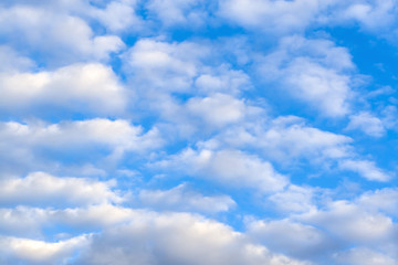 Naklejka na ściany i meble A blue cloudy sky. Background.