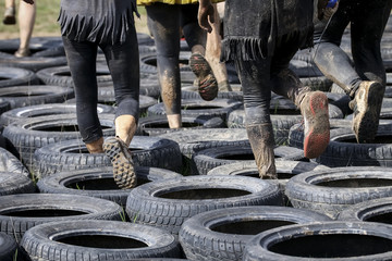 Mud race runners during extreme obstacle races