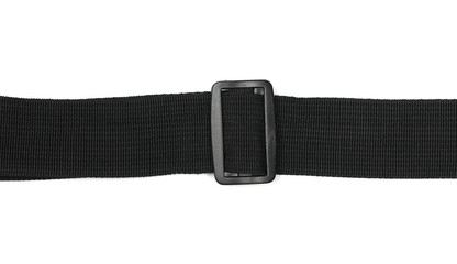 Black synthetic nylon fastening belt, strap isolated on white background, top view