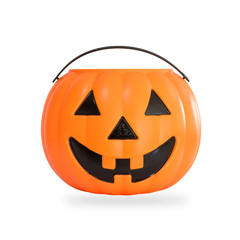 Fototapeta premium Pumpkin basket isolated on white background (clipping path) for kid collecting candy Jack o'lantern basket , trick or treat on Halloween day celebration