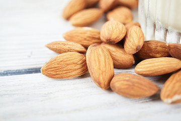 Dry almond close up on wood desk