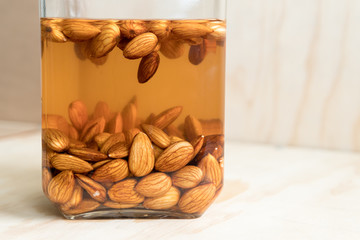Activated almonds soaking in a glass of water