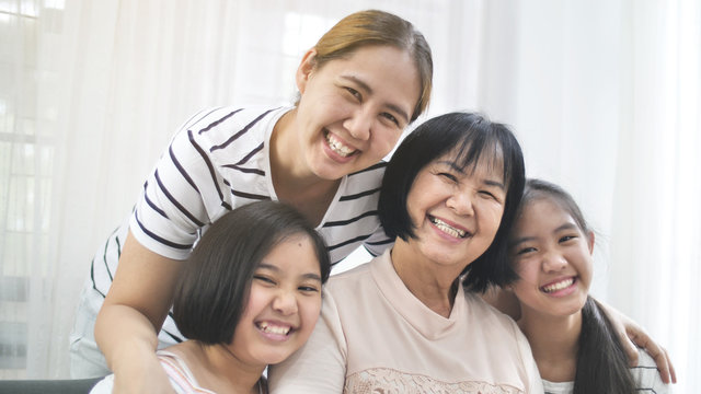 Happy Asian Family Smiling Together At Home, Multi Generation Of Female