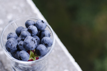 A glass of sweet blueberries