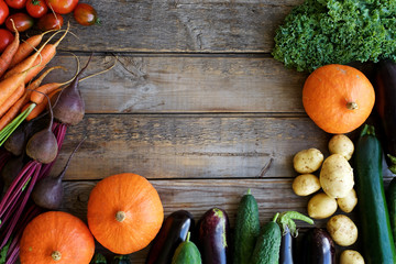 Autumn set of vegetables. Wooden food background. Organic farm vegetables
