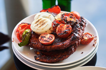 Tasty grilled ribs with vegetables