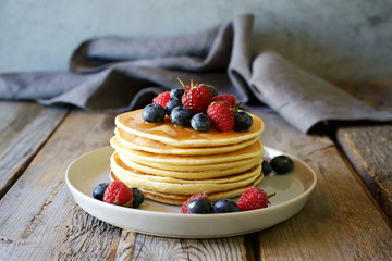 Buddha bowl with quinoa, salad, cucumber, green bell and avocado. The concept of healthy diet. Gray marble background

