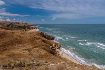 Fototapeta na wymiar Wild beach on the Black Sea in the Crimea