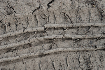 tire track on  sandy road macro