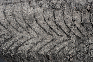 tire track on  sandy road macro