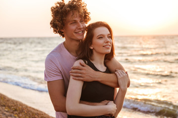 Fototapeta premium Young happy loving couple hugging