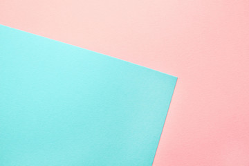 Abstract geometric water color paper background in soft pastel pink and blue trend colors.