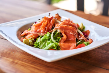 Salad - smoked salmon with vegetables..