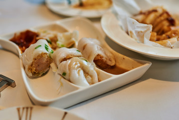 A plate of Japanese gyoza dumplings on the table.