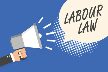 Conceptual hand writing showing Labour Law. Business photo text Rules implemented by the state between employers and employee Man holding megaphone loudspeaker speech bubble blue background.