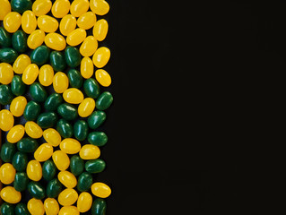 Background with various colorful candy with copy space.