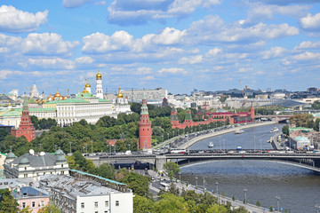 Fototapeta premium Enlarged image of the Moscow Kremlin and the river. The photo was taken from the observation platform of the Cathedral of Christ the Savior. Russia, Moscow, August 2018.