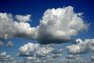 Sky. Volumetric spectacular clouds. The sun