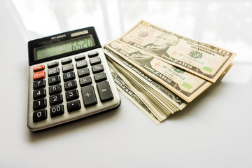 Close-up  Money and Calculator, American Dollar Banknotes