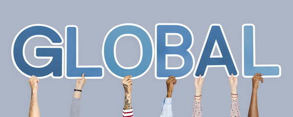 Hands holding up blue letters forming the word global