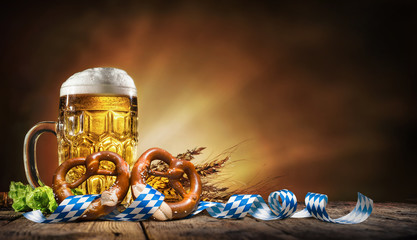 Oktoberfest beer with pretzel, wheat and hops - obrazy, fototapety, plakaty