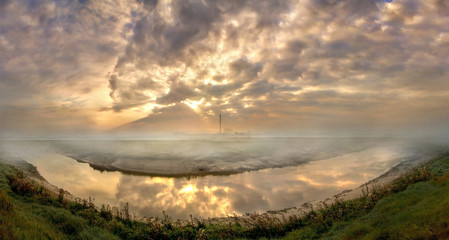 River on a misty Sunrise