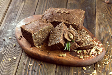 baked bread on wooden table background
