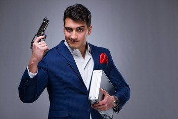 Handsome man against gray background