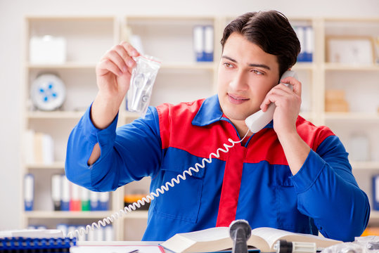 Worker in uniform working on project