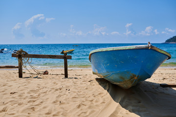 Wooden fishing boat on the beach.