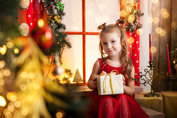 Cute girl in a christmas studio