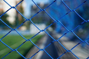 Steel blue nets or mesh with defocused background for web site or mobile devices