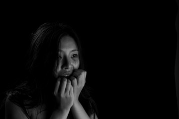 Human trafficking concept, End to violence against women, Scared woman with man's hand covering her...