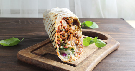 shaurma kebab on a wooden background
