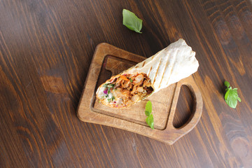 shaurma kebab on a wooden background